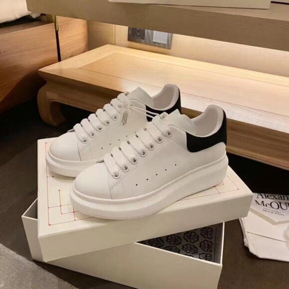 Alexander McQueen Black and White Leather Sneakers - Picture 1 of 7